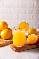 Refreshing homemade orangeade, a natural hydrating drink made from orange juice, very popular in several countries, ideal to drink in hot summers.