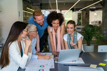 Group of multiethnic business people working together on conference and meeting in modern office