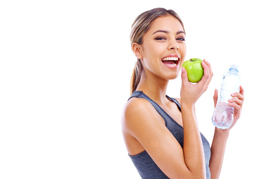 Happy woman, apple and water for nutrition or diet isolated on a transparent PNG background. Portrait of female person, bottle and organic fruit or food in fitness for natural and healthy eating