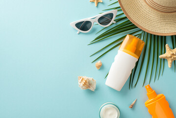 UV Safety Awareness Month. High angle view photo of sun protection lotion, sunglasses, straw hat...
