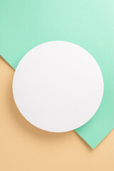 Modern abstract background concept. Above view photo of white empty circle on two-colored beige and turquoise abstract background with copy-space