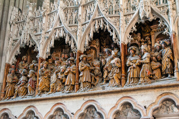 Fototapeta premium Christian stone carved choir scenes in the cathedral of Amiens