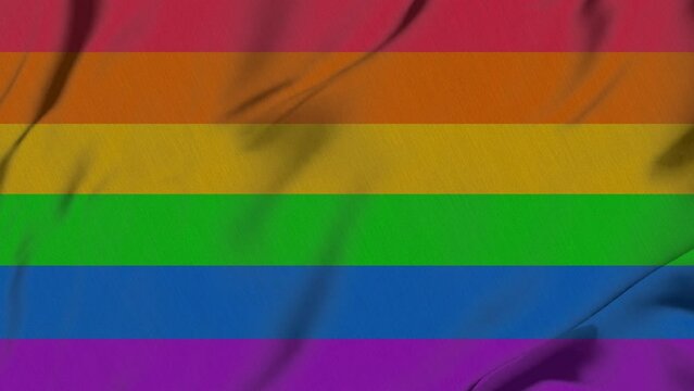 rainbow flag background. Happy pride month. Rainbow LGBT pride flag waving in wind. Seamlessly looping. flag background pride month.