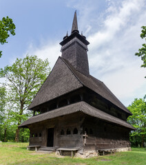 Fototapeta na wymiar Medieval Gothic wooden church in Danylovo village , Ukraine