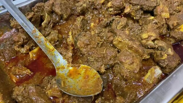 Mutton Kassa cooked in Bengal style in a Indian wedding.