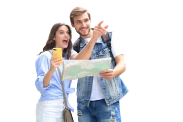 Foto op Canvas Beautiful young couple holding a map and smiling while standing on a transparent background. © ty