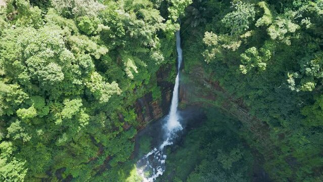 Aerial view of Coban Kapas Biru waterfall. East Java, Indonesia