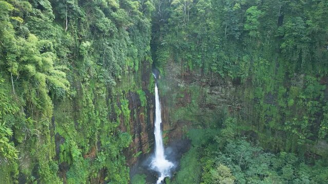 Aerial view of Coban Kapas Biru waterfall. East Java, Indonesia