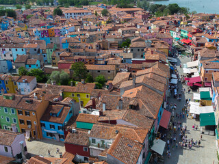 Burano positive colorful rainbow island. City on the water Venice. Drone view