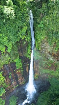 Aerial view of Coban Kapas Biru waterfall. East Java, Indonesia