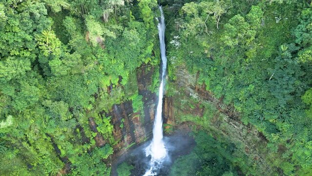 Aerial view of Coban Kapas Biru waterfall. East Java, Indonesia