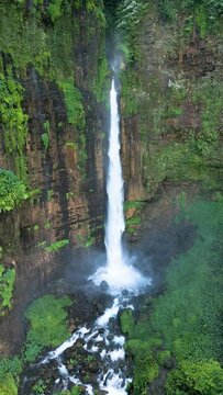 Aerial view of Coban Kapas Biru waterfall. East Java, Indonesia