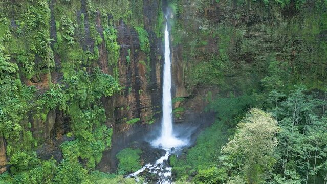 Aerial view of Coban Kapas Biru waterfall. East Java, Indonesia