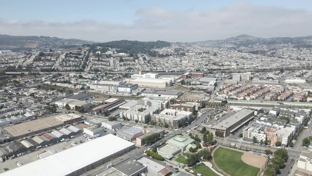 This drone footage captures a serene flyby over the Bayview neighborhood in San Francisco. The flight path is parallel to the 280 Highway
