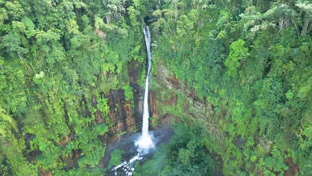 Aerial view of Coban Kapas Biru waterfall. East Java, Indonesia