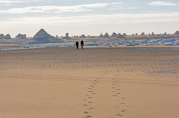 Barren desert landscape in hot climate with rock formation