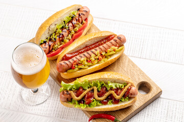 Various hot dog and beer