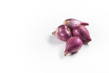 Photo of shallot bulbs on isolated white background