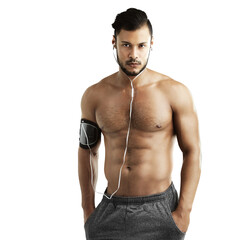 Fototapeta premium Portrait, shirtless and serious man with earphones for music isolated on transparent png background. Sports, radio and bodybuilder listen to exercise, muscle or fitness podcast with hands in pocket