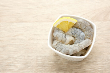 Fresh peeled shrimps (udang kupas), food preparation.
