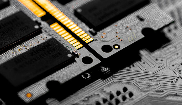Macro Close up of computer RAM chip and motherboard