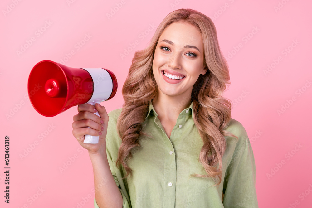 Poster Photo of adorable charming lady wear green shirt rising bullhorn telling message isolated pink color background