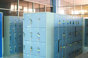 Lockers cabinets with keys in a locker room at school or gym or station for concept technology data log security 
