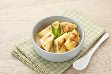 Pisang Gapit or Pisang Epe, grilled banana with palm sugar sauce. Indonesian traditional food.
