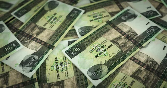 Ethiopia Birr growing pile of money. ETB banknotes loop rotaring. Seamless and looped background concept of finance, economy crisis, inflation and business.