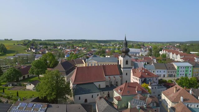 Amazing aerial top view flight 
Church in village Heidenreichstein, city in Austria Europe, summer day of 2023. descending drone
4K uhd cinematic footage.