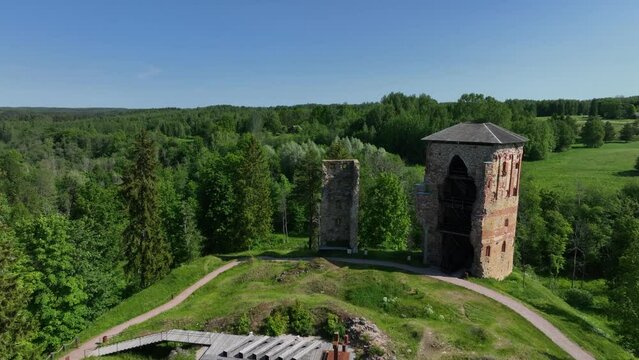 Approaching aerial view of ruins of Vastseliina Episcopal Castle. Estonia.