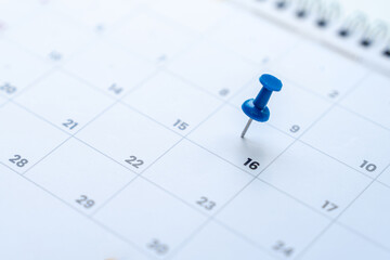 Deadline concept with push pin on calendar date, Clos-up