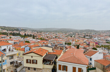 Fototapeta na wymiar Cesme historic town center view from Cesme Castle walls (Izmir province, Turkiye)