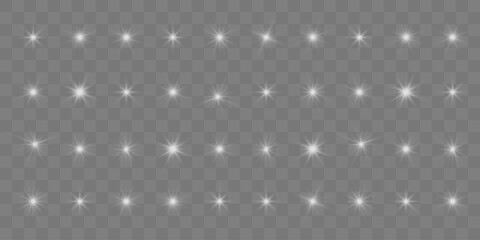 Sparkling stars, twinkling and flashing lights. Collection of various light effects on a transparent background.