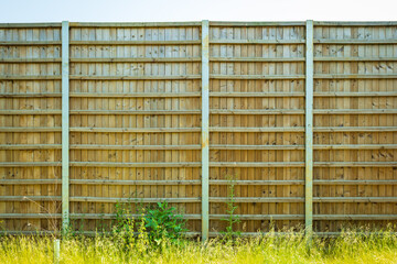 wooden boarded fence background in english town uk