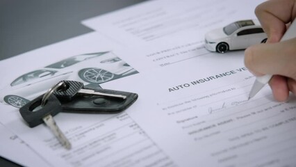 Buyers or sellers who are reading car lease or car insurance contract and signing. Sale agent deal to agreement car loan contract with customer and sign agreement contract, car Insurance concept. - Powered by Adobe