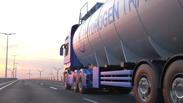 Generic electric semi truck with hydrogen tank trailer driving along a bridge or coastal road into the sunset with wind turbines in background. Green energy concept. Realistic 3d rendering animation.