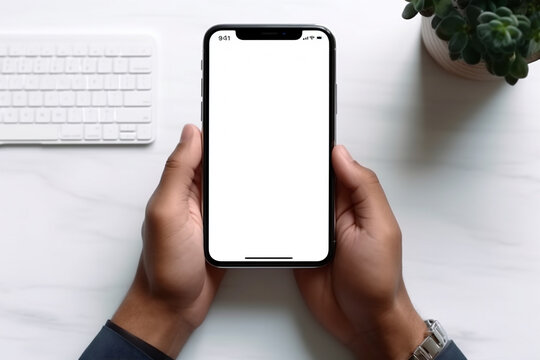 Top view of businessman hands using smartphone mockup at the white office desk. Blank screen mobile phone for graphic display montage. AI Generative
