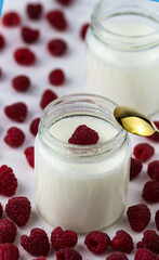 Side view of the apetite healthy yogurt. Homemade yogurt with raspberries