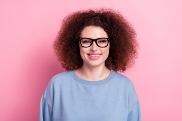 Photo of funky cheerful lady dressed blue pullover eyewear smiling isolated pink color background