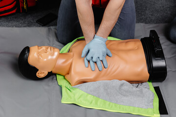 First Aid Training - Cardiopulmonary resuscitation. First aid course on cpr dummy.