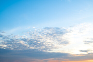 Fototapeta premium beautiful , luxury soft gradient orange gold clouds and sunlight on the blue sky perfect for the background, take in everning,Twilight