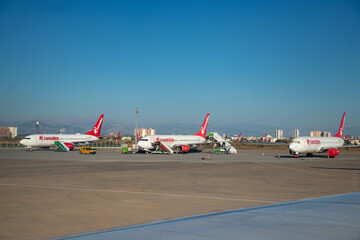 An airport with planes of different airlines.