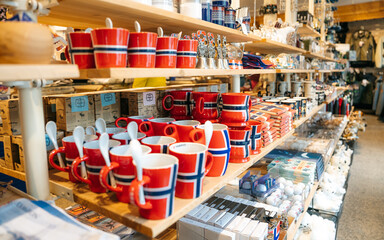 Tromso, Norway 10.6.2023: Small shop of Norwegian souvenirs in Tromso - obrazy, fototapety, plakaty