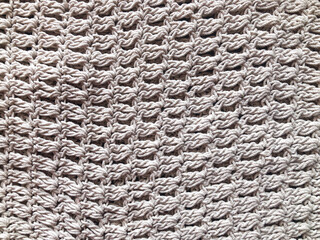 White knit wool texture background.