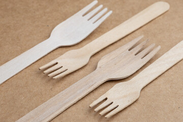 wooden cutlery and paper straws 