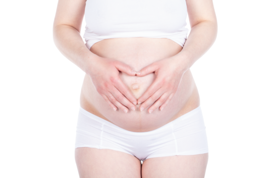 Pregnant woman making a heart shape on her belly. Isolated on transparent white background