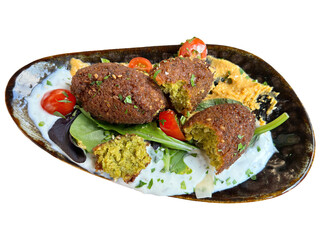 Fresh falafel in small ceramic bowl with salad and hummus isolated png file