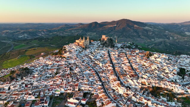 aerial view of Castillo de Olvera Towering On White Village In Olvera, Province of Cadiz, Spain