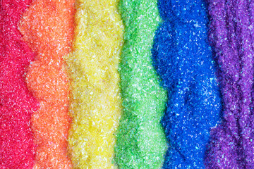 Multicolored rainbow glitter background. Beautiful shiny multi-colored background